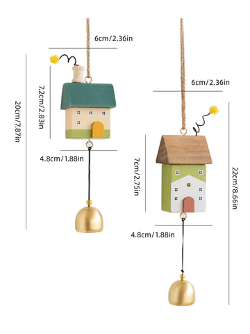 Whimsical wooden house wind chimes with golden bell accents hanging on a rustic frame, perfect for home and garden décor.