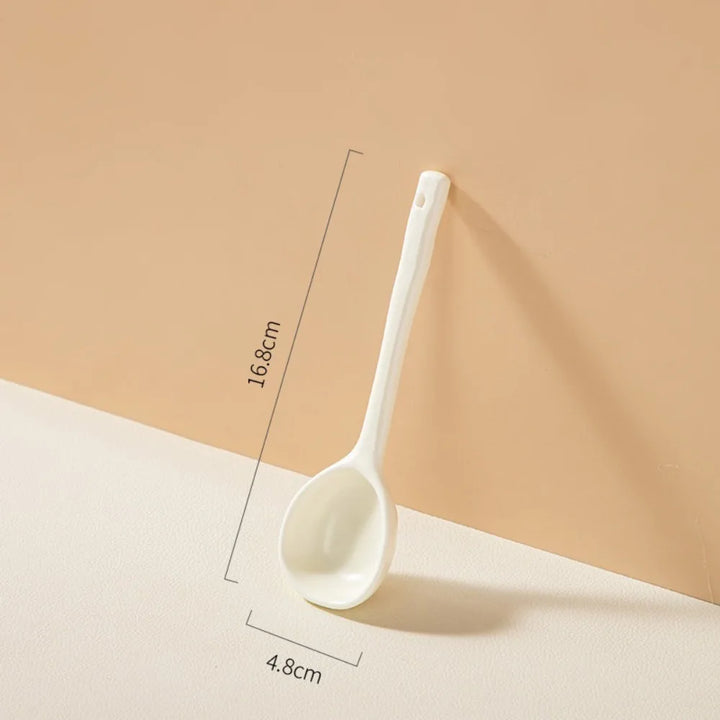 Close-up of pastel ceramic spoon showcasing their soft colors and high-quality finish