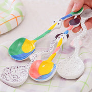 Set of colorful ceramic spoons with unique, artistic designs