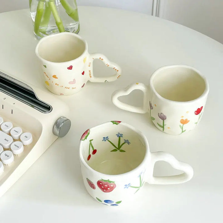 Cute Ceramic Mugs with Heart-Shaped Handles and Hand-Painted Floral and Fruit Designs