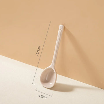 Close-up of pastel ceramic spoon showcasing their soft colors and high-quality finish