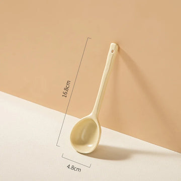 Close-up of pastel ceramic spoon showcasing their soft colors and high-quality finish