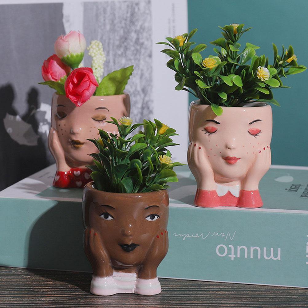 head shaped pots for plants Doll head planters