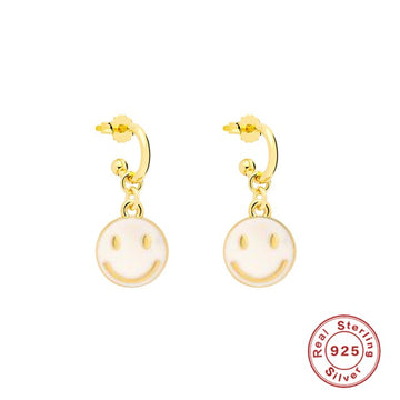 smiling face hoop earrings white