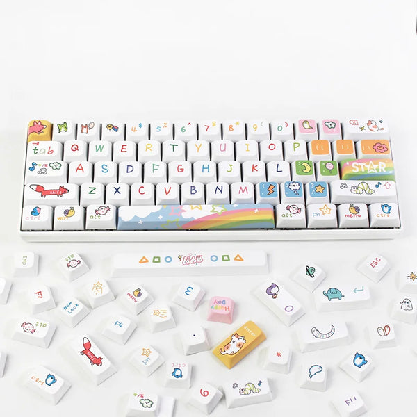 Close-up view of a white keyboard with colorful, hand-drawn Kawaii keycaps, featuring playful icons and symbols on the keys