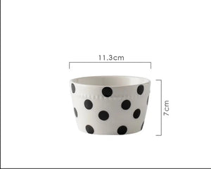 Detail view of a polka dot ceramic dish showing the intricate pattern