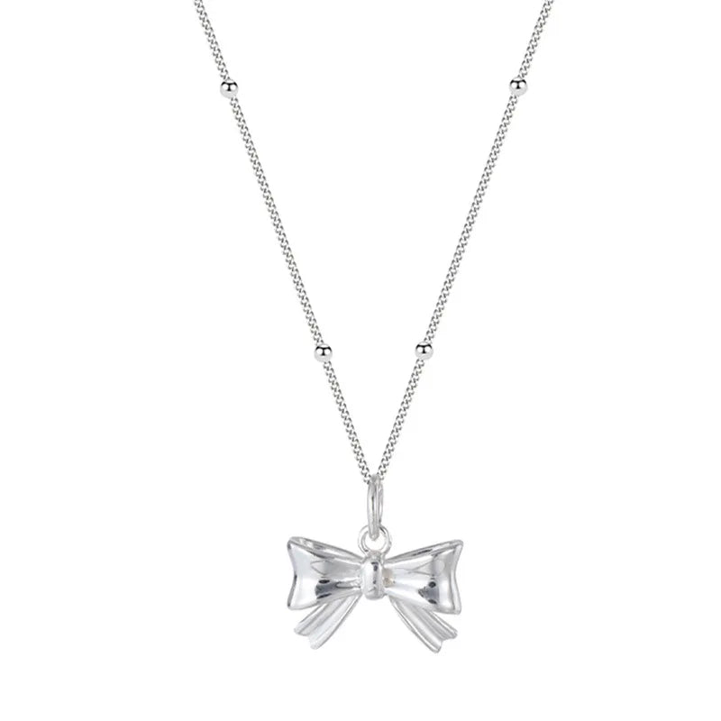 Ted baker silver bow necklace online