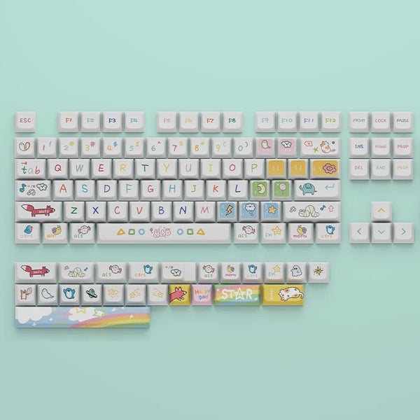 Close-up view of a white keyboard with colorful, hand-drawn Kawaii keycaps, featuring playful icons and symbols on the keys