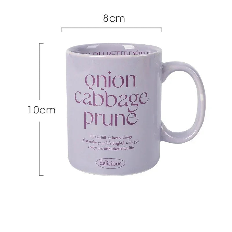 Breakfast-inspired pastel ceramic mugs with playful text designs, featuring unique flavor themes like Salted Basil Butter and Cherry Strawberry, perfect for aesthetic coffee or tea moments