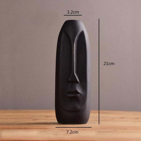 abstract face vase tall black