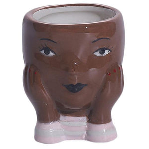 doll head planters brown