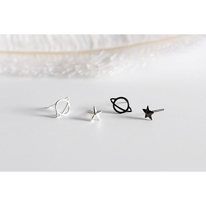 mismatched planet stud earrings