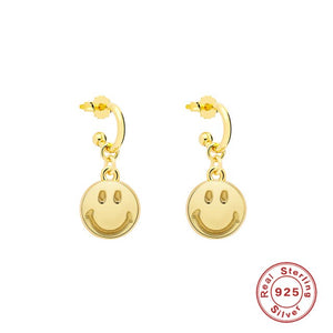 smiling face hoop earrings gold