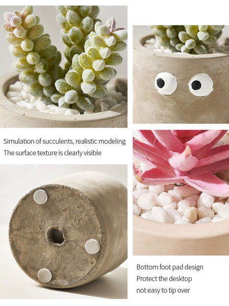 cement flower pot with artificial succulents