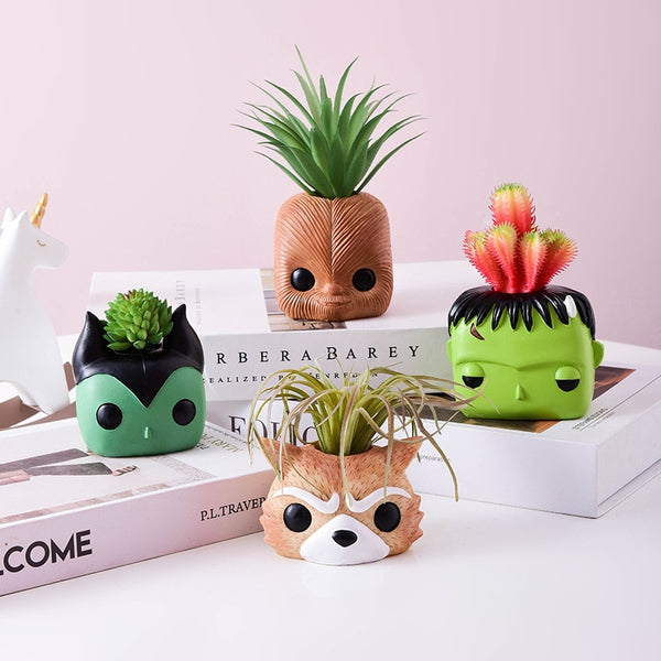 artificial plants in cute ceramic planters