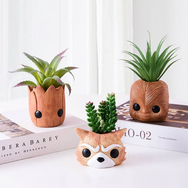 artificial plants in cute ceramic planters