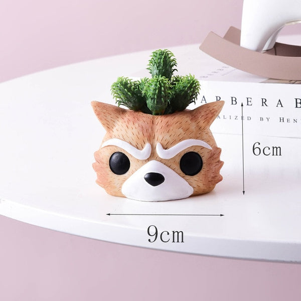 artificial plants in cute ceramic planters rocket raccon